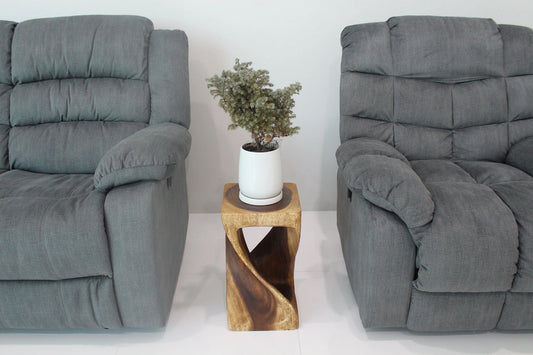 Walnut Original Twist hand-carved wood end table, 10 x 10 x 18 inches, in a furnished room