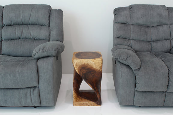 Original Twist Walnut end table between two gray armchairs, shown without accessories