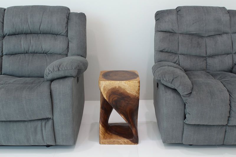 Original Twist Walnut end table between two gray armchairs, shown without accessories