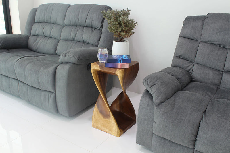 Walnut Original Twist hand-carved wood end table, 12 x 12 x 26 inches, in a furnished room