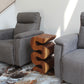 Haussmann Big Wave hand-carved wood end table, Walnut, 12 x 14 x 25 in H, in a room